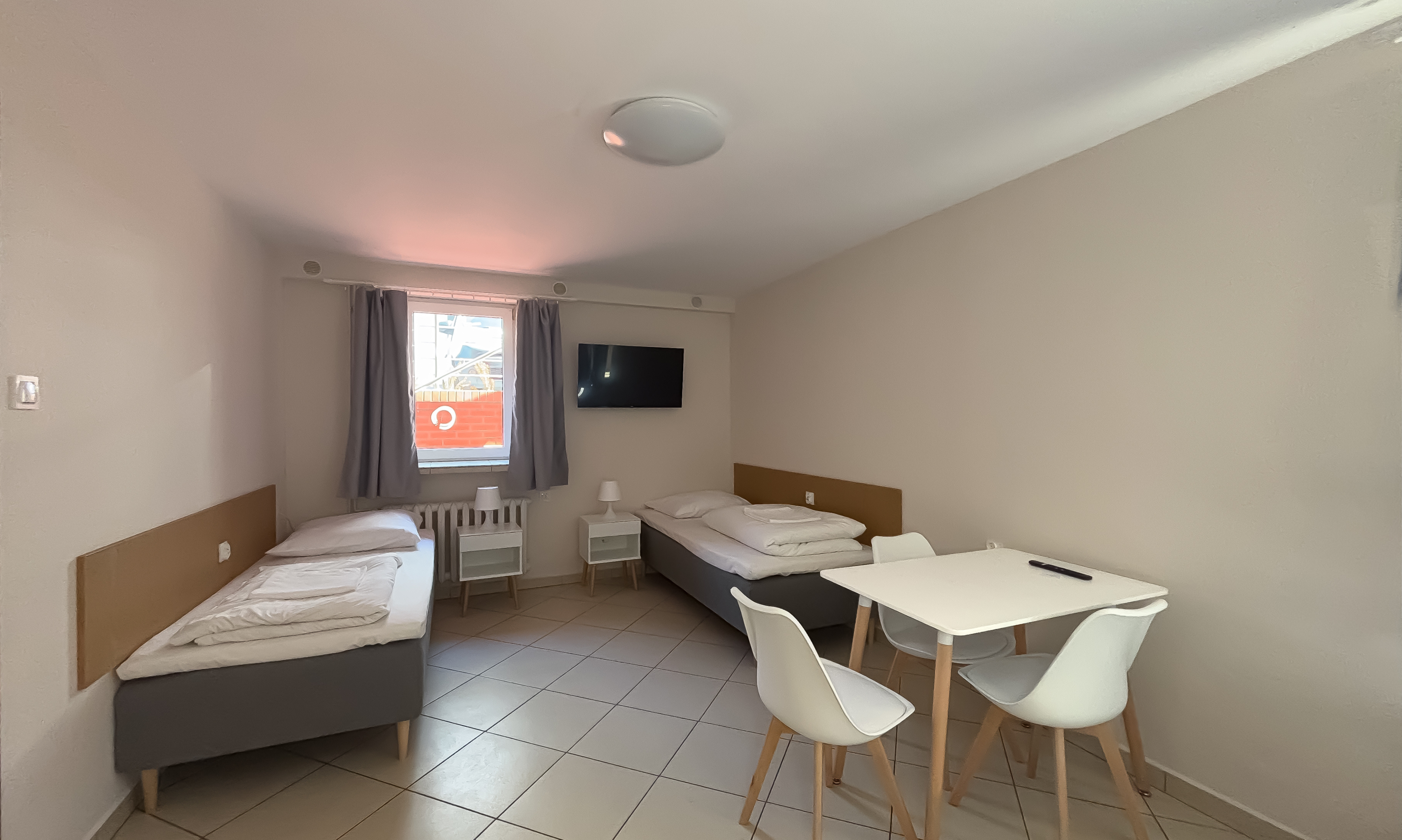 Pokój trzyosobowy ze wspólną łazienką